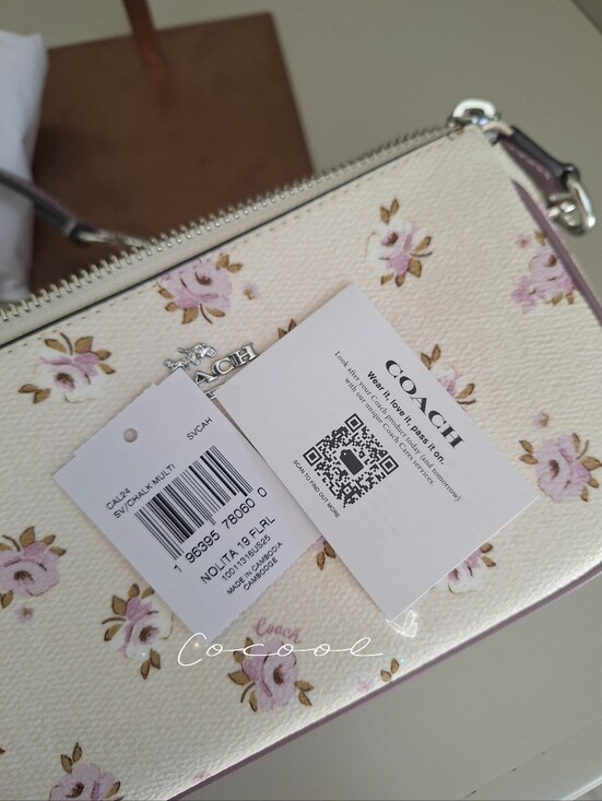 NWT COACH Nolita 19 Signature Canvas Floral Print Wristlet plus extended chain main image 0